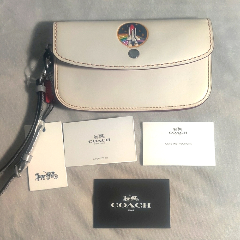 Coach 1941 Embossed NASA space clutch wristlet